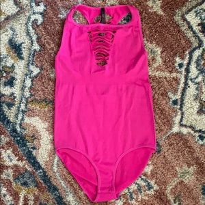 Bright neon pink rave 80s leotard jazzercise